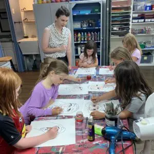 A Group of Children Painting Together