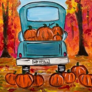 The Backside Section of a Truck With Pumpkins
